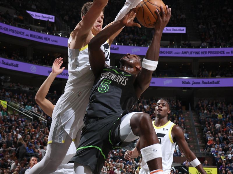 SALT LAKE CITY, UT - MARCH 16: Anthony Edwards #5 of the Minnesota Timberwolves drives to the basket during the game against the Utah Jazz on March 16, 2024 at Delta Center in Salt Lake City, Utah. NOTE TO USER: User expressly acknowledges and agrees that, by downloading and or using this Photograph, User is consenting to the terms and conditions of the Getty Images License Agreement. Mandatory Copyright Notice: Copyright 2024 NBAE (Photo by Melissa Majchrzak/NBAE via Getty Images)