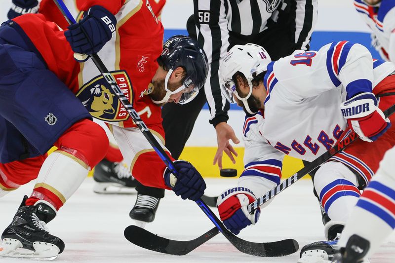 May 26, 2024; Sunrise, Florida, USA; Florida Panthers center Aleksander Barkov (16) and New York Rangers center Vincent Trocheck (16) face-off during the first period in game three of the Eastern Conference Final of the 2024 Stanley Cup Playoffs at Amerant Bank Arena. Mandatory Credit: Sam Navarro-USA TODAY Sports