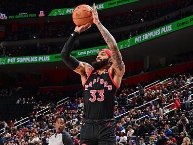 DETROIT, MI - DECEMBER 30: Gary Trent Jr. #33 of the Toronto Raptors shoots a three point basket during the game against the Detroit Pistons on December 30, 2023 at Little Caesars Arena in Detroit, Michigan. NOTE TO USER: User expressly acknowledges and agrees that, by downloading and/or using this photograph, User is consenting to the terms and conditions of the Getty Images License Agreement. Mandatory Copyright Notice: Copyright 2023 NBAE (Photo by Chris Schwegler/NBAE via Getty Images)