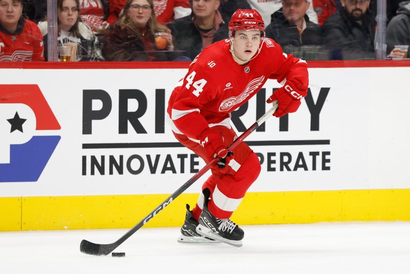 Dec 17, 2025; Detroit, Michigan, USA;  Detroit Red Wings defenseman Axel Sandin-Pellikka (44) skates with the puck in the second period against the Utah Mammoth at Little Caesars Arena. Mandatory Credit: Rick Osentoski-Imagn Images
