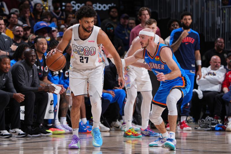 DENVER, CO - MAY 15:  Jamal Murray #27 of the Denver Nuggets dribbles the ball during the game  against the Oklahoma City Thunder during Round 2 Game 6 of the 2025 NBA Playoffs  on May 15, 2025 at Ball Arena in Denver, Colorado. NOTE TO USER: User expressly acknowledges and agrees that, by downloading and/or using this Photograph, user is consenting to the terms and conditions of the Getty Images License Agreement. Mandatory Copyright Notice: Copyright 2025 NBAE (Photo by Garrett Ellwood/NBAE via Getty Images)