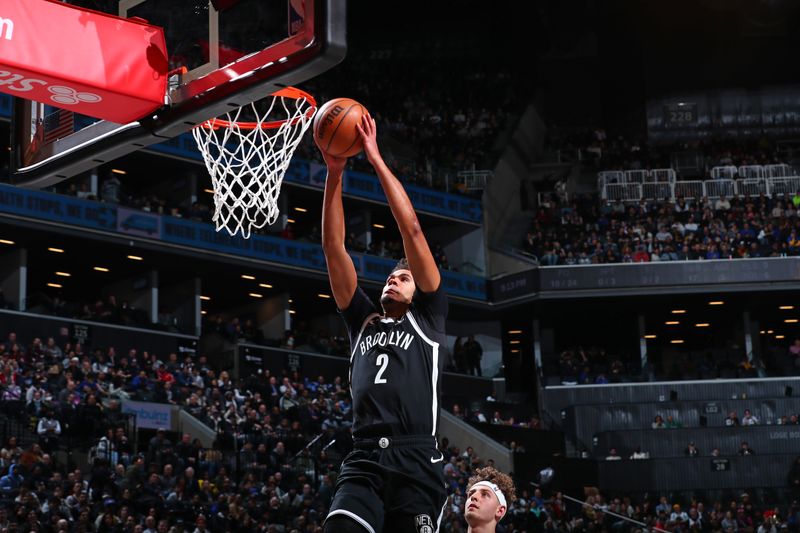 BROOKLYN, NY - FEBRUARY 5: Cameron Johnson #2 of the Brooklyn Nets dunks the ball during the game against the Golden State Warriors on February 5, 2024 at Barclays Center in Brooklyn, New York. NOTE TO USER: User expressly acknowledges and agrees that, by downloading and or using this Photograph, user is consenting to the terms and conditions of the Getty Images License Agreement. Mandatory Copyright Notice: Copyright 2024 NBAE (Photo by David L. Nemec/NBAE via Getty Images)