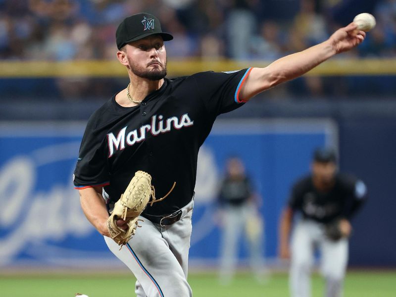 Jul 30, 2024; St. Petersburg, Florida, USA; Miami Marlins pitcher Austin Kitchen (91) gets ready to throw a pitch for his major league debut against the Tampa Bay Rays during the seventh inning at Tropicana Field. Mandatory Credit: Kim Klement Neitzel-USA TODAY Sports