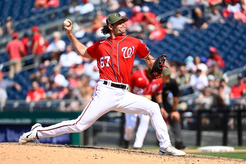 May 21, 2023; Washington, District of Columbia, USA; Washington Nationals relief pitcher Kyle Finnegan (67) throws to the Detroit Tigers during the seventh inning at Nationals Park. Mandatory Credit: Brad Mills-USA TODAY Sports