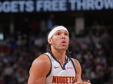 DENVER, CO - DECEMBER 25: Aaron Gordon #50 of the Denver Nuggets shoots a free throw during the game against the Golden State Warriors on December 25, 2023 at the Ball Arena in Denver, Colorado. NOTE TO USER: User expressly acknowledges and agrees that, by downloading and/or using this Photograph, user is consenting to the terms and conditions of the Getty Images License Agreement. Mandatory Copyright Notice: Copyright 2023 NBAE (Photo by Bart Young/NBAE via Getty Images)