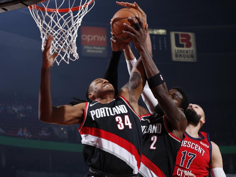 PORTLAND, OR - FEBRUARY 10: Jabari Walker #34 of the Portland Trail Blazers rebounds the ball during the game against the New Orleans Pelicans on February 10, 2024 at the Moda Center Arena in Portland, Oregon. NOTE TO USER: User expressly acknowledges and agrees that, by downloading and or using this photograph, user is consenting to the terms and conditions of the Getty Images License Agreement. Mandatory Copyright Notice: Copyright 2024 NBAE (Photo by Cameron Browne/NBAE via Getty Images)