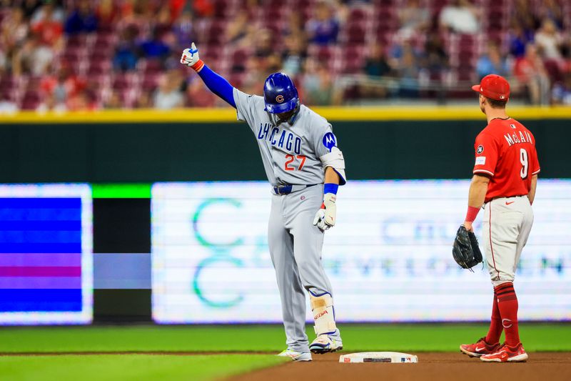 Sep 18, 2025; Cincinnati, Ohio, USA; Chicago Cubs outfielder Seiya Suzuki (27) reacts after hitting a double in the seventh inning against the Cincinnati Reds at Great American Ball Park. Mandatory Credit: Katie Stratman-Imagn Images