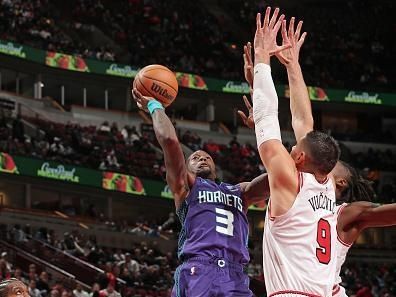 CHICAGO, IL - DECEMBER 6: Terry Rozier #3 of the Charlotte Hornets shoots the ball during the game against the Chicago Bulls on December 6, 2023 at the United Center in Chicago, Illinois. NOTE TO USER: User expressly acknowledges and agrees that, by downloading and or using this Photograph, user is consenting to the terms and conditions of the Getty Images License Agreement. Mandatory Copyright Notice: Copyright 2023 NBAE (Photo by Gary Dineen/NBAE via Getty Images).