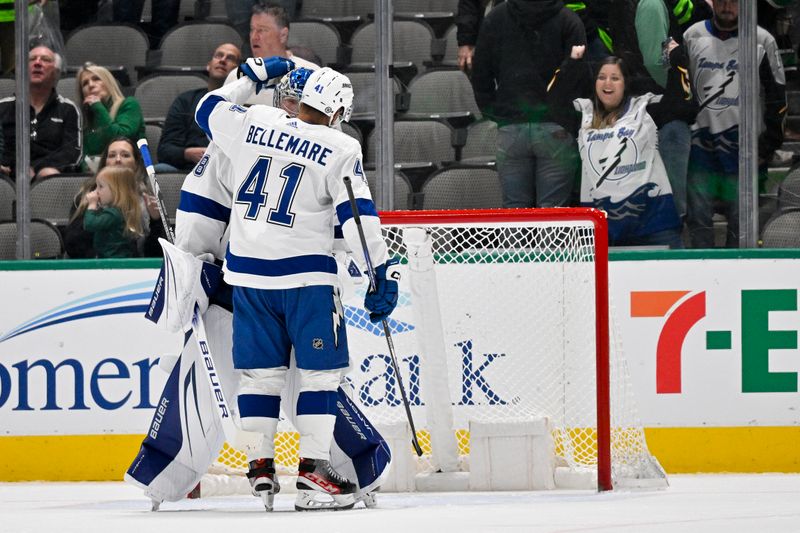 Feb 11, 2023; Dallas, Texas, USA; Tampa Bay Lightning left wing Pierre-Edouard Bellemare (41) and goaltender Andrei Vasilevskiy (88) celebrate the win over the Dallas Stars at the American Airlines Center. Mandatory Credit: Jerome Miron-USA TODAY Sports