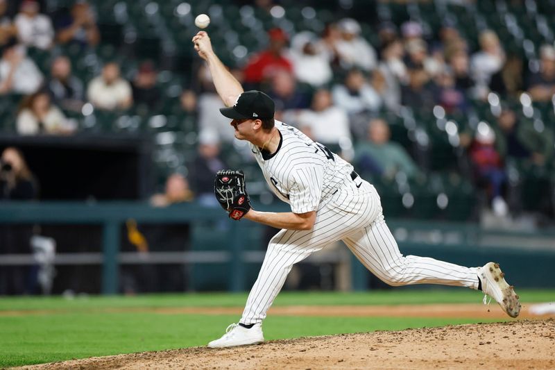 Apr 30, 2024; Chicago, Illinois, USA; Chicago White Sox relief pitcher Jordan Leasure (49) delivers a pitch against the Minnesota Twins during the eight inning at Guaranteed Rate Field. Mandatory Credit: Kamil Krzaczynski-USA TODAY Sports