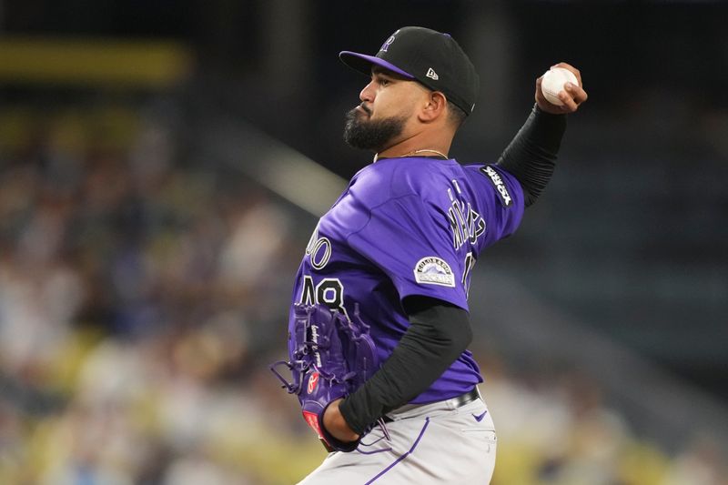 Sep 9, 2025; Los Angeles, California, USA;  Colorado Rockies starting pitcher German Marquez (48) throws against the Los Angeles Dodgers during the second inning of the game at Dodger Stadium. Mandatory Credit: Kirby Lee-Imagn Images
