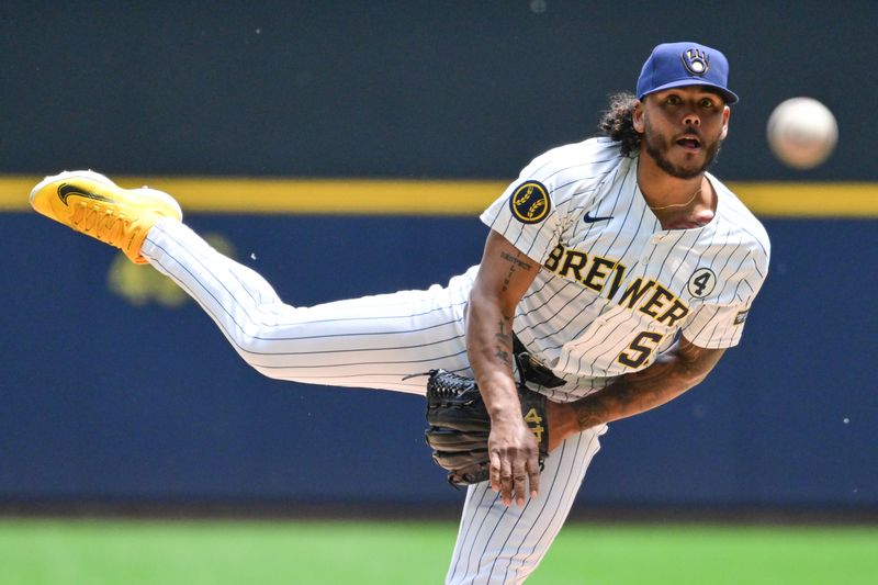 Jun 2, 2024; Milwaukee, Wisconsin, USA; Milwaukee Brewers starting pitcher Freddy Peralta (51) pitches against the Chicago White Sox in the first inning at American Family Field. Mandatory Credit: Benny Sieu-USA TODAY Sports