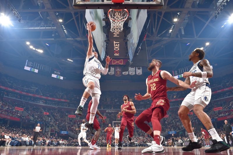 CLEVELAND, OH - FEBRUARY 27: Luka Doncic #77 of the Dallas Mavericks drives to the basket during the game against the Cleveland Cavaliers on February 27, 2024 at Rocket Mortgage FieldHouse in Cleveland, Ohio. NOTE TO USER: User expressly acknowledges and agrees that, by downloading and/or using this Photograph, user is consenting to the terms and conditions of the Getty Images License Agreement. Mandatory Copyright Notice: Copyright 2024 NBAE (Photo by David Liam Kyle/NBAE via Getty Images)