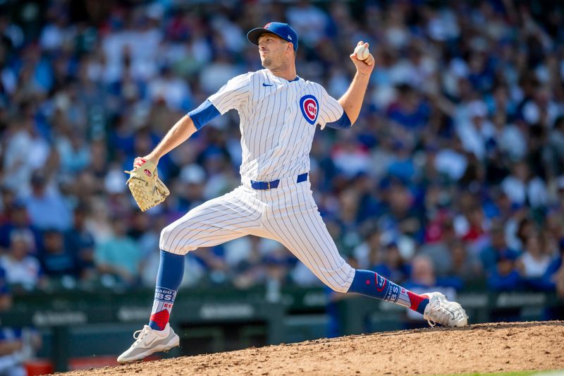 Aug 17, 2024; Chicago, Illinois, USA; Chicago Cubs relief pitcher Drew Smyly (11) pitches during the seventh inning against the Toronto Blue Jays at Wrigley Field. Mandatory Credit: Patrick Gorski-USA TODAY Sports