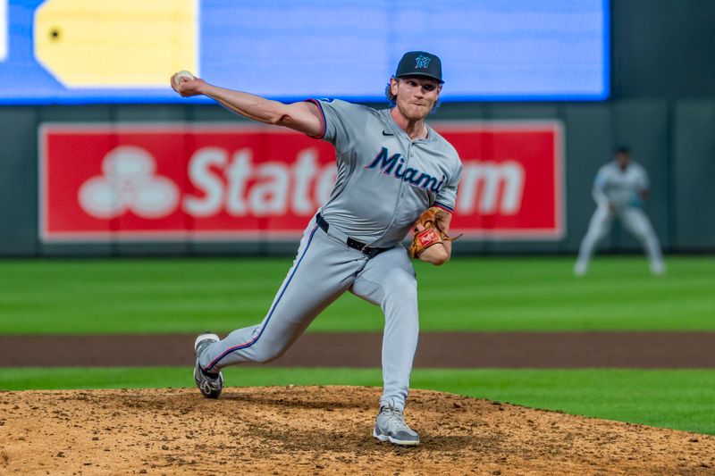 Sep 25, 2024; Minneapolis, Minnesota, USA; Miami Marlins pitcher Declan Cronin (51) delivers a pitch in the seventh inning against the Minnesota Twins at Target Field. Mandatory Credit: Jesse Johnson-Imagn Images