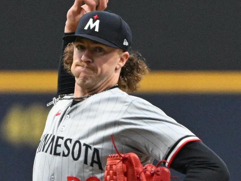 Apr 3, 2024; Milwaukee, Wisconsin, USA; Minnesota Twins starting pitcher Chris Paddack (20) delivers a pitch against the Milwaukee Brewers in the first inning at American Family Field. Mandatory Credit: Michael McLoone-USA TODAY Sports