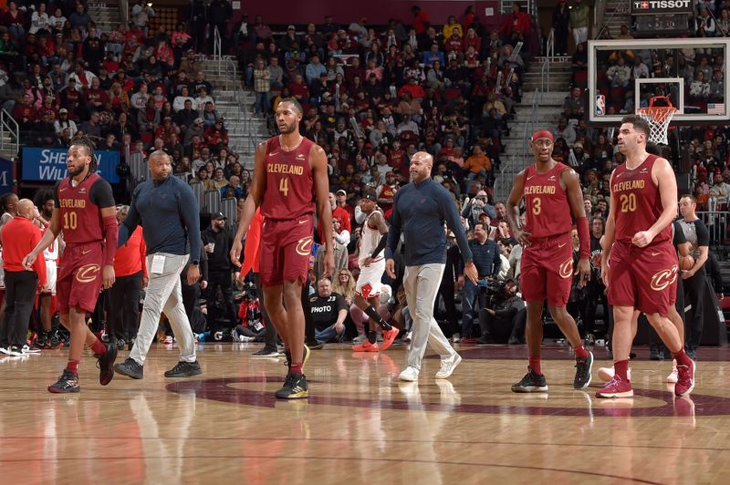 CLEVELAND, OH - FEBRUARY 14: The Cleveland Cavaliers walk towards the bench during the game against the Chicago Bulls on February 14, 2024 at Rocket Mortgage FieldHouse in Cleveland, Ohio. NOTE TO USER: User expressly acknowledges and agrees that, by downloading and/or using this Photograph, user is consenting to the terms and conditions of the Getty Images License Agreement. Mandatory Copyright Notice: Copyright 2024 NBAE (Photo by David Liam Kyle/NBAE via Getty Images)