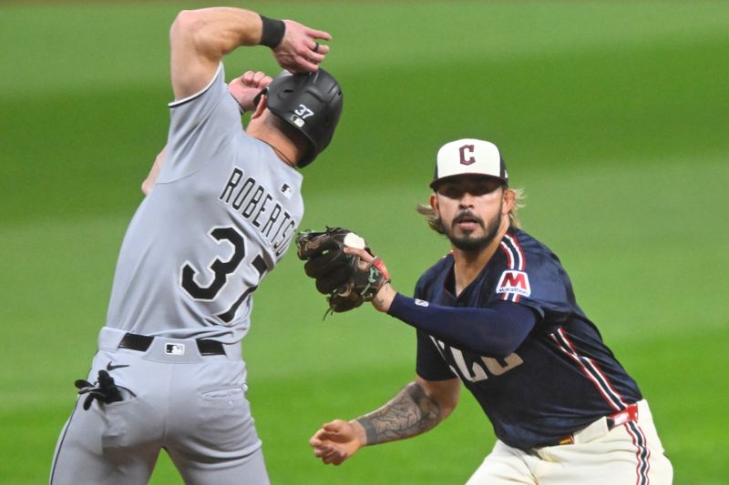 Sep 12, 2025; Cleveland, Ohio, USA; Cleveland Guardians shortstop Gabriel Arias (13) tags out Chicago White Sox left fielder Will Robertson (37) in the third inning at Progressive Field. Mandatory Credit: David Richard-Imagn Images