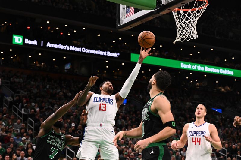 BOSTON, MASSACHUSETTS - JANUARY 27: Paul George #13 of the LA Clippers attempts a basket against the Boston Celtics during the third quarter at the TD Garden on January 27, 2024 in Boston, Massachusetts. NOTE TO USER: User expressly acknowledges and agrees that, by downloading and or using this photograph, User is consenting to the terms and conditions of the Getty Images License Agreement. (Photo by Brian Fluharty/Getty Images)