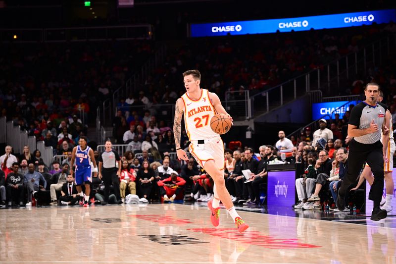 ATLANTA, GA - OCTOBER 14: Vit Krejci #27 of the Atlanta Hawks dribbles the ball during the game against the Philadelphia 76ers  during a preseason game on October 14, 2024 at State Farm Arena in Atlanta, Georgia.  NOTE TO USER: User expressly acknowledges and agrees that, by downloading and/or using this Photograph, user is consenting to the terms and conditions of the Getty Images License Agreement. Mandatory Copyright Notice: Copyright 2024 NBAE (Photo by Adam Hagy/NBAE via Getty Images)