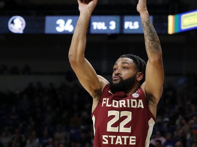 Jan 21, 2023; Pittsburgh, Pennsylvania, USA;  Florida State Seminoles guard Darin Green Jr. (22) shoots a three point basket against the Pittsburgh Panthers during the first half at the Petersen Events Center. Mandatory Credit: Charles LeClaire-USA TODAY Sports