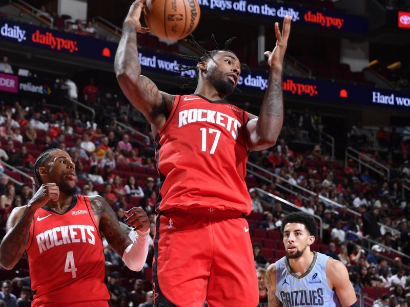 HOUSTON, TX - OCTOBER 25: Tari Eason #17 of the Houston Rockets rebounds the ball during the game against the Memphis Grizzlies on October 25, 2024 at the Toyota Center in Houston, Texas. NOTE TO USER: User expressly acknowledges and agrees that, by downloading and or using this photograph, User is consenting to the terms and conditions of the Getty Images License Agreement. Mandatory Copyright Notice: Copyright 2024 NBAE (Photo by Logan Riely/NBAE via Getty Images)