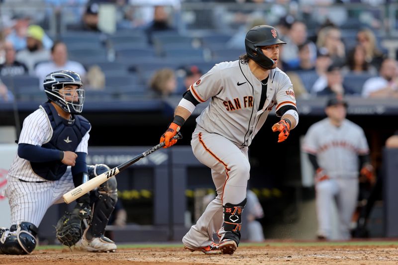 Apr 1, 2023; Bronx, New York, USA; San Francisco Giants shortstop Brandon Crawford (35) follows through on a double against the New York Yankees during the sixth inning at Yankee Stadium. Mandatory Credit: Brad Penner-USA TODAY Sports