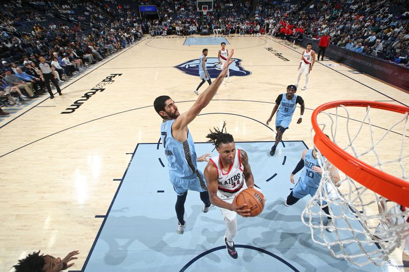 MEMPHIS, TN - MARCH 2: Jabari Walker #34 of the Portland Trail Blazers shoots the ball during the game against the Memphis Grizzlies on March 2, 2024 at FedExForum in Memphis, Tennessee. NOTE TO USER: User expressly acknowledges and agrees that, by downloading and or using this photograph, User is consenting to the terms and conditions of the Getty Images License Agreement. Mandatory Copyright Notice: Copyright 2024 NBAE (Photo by Joe Murphy/NBAE via Getty Images)