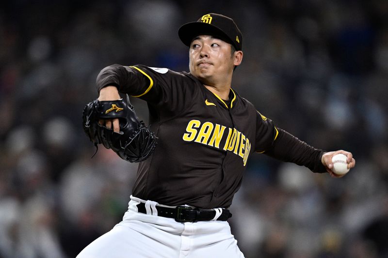 Mar 25, 2024; San Diego, California, USA; San Diego Padres relief pitcher Yuki Matsui (1) throws a pitch against the Seattle Mariners during the eighth inning at Petco Park. Mandatory Credit: Orlando Ramirez-USA TODAY Sports