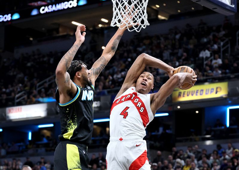 INDIANAPOLIS, INDIANA - FEBRUARY 26: Scottie Barnes #4 of the Toronto Raptors shoots the ball while defended by Obi Toppin #1 of  the Indiana Pacers at Gainbridge Fieldhouse on February 26, 2024 in Indianapolis, Indiana.    NOTE TO USER: User expressly acknowledges and agrees that, by downloading and or using this photograph, User is consenting to the terms and conditions of the Getty Images License Agreement.  (Photo by Andy Lyons/Getty Images)