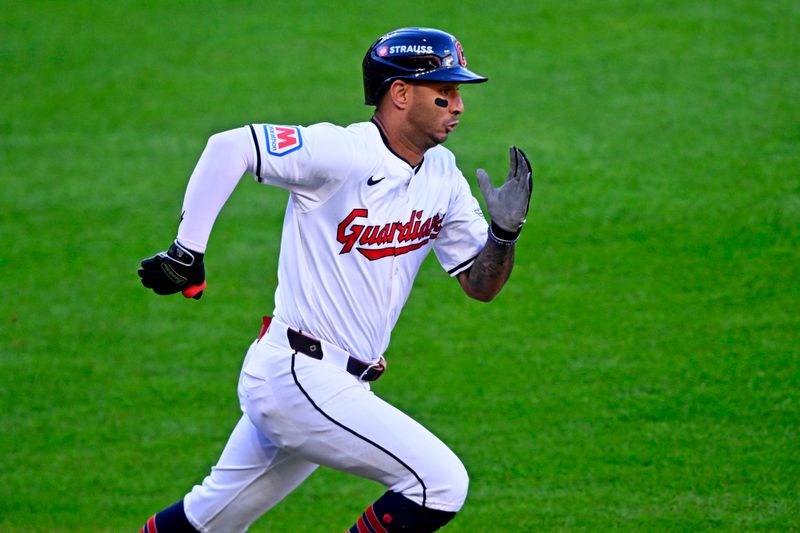 Oct 7, 2024; Cleveland, Ohio, USA; Cleveland Guardians shortstop Brayan Rocchio (4) runs after hitting a double during the sixth inning against the Detroit Tigers during game two of the ALDS for the 2024 MLB Playoffs at Progressive Field. Mandatory Credit: David Richard-Imagn Images