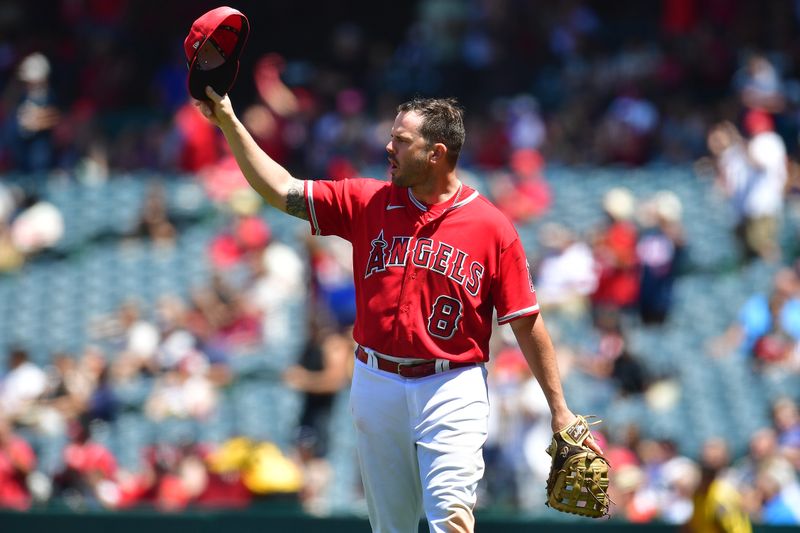 Jun 29, 2023; Anaheim, California, USA; Los Angeles Angels first baseman Mike Moustakas (8) reacts after center fielder Mike Trout (27) catches the fly ball of Chicago White Sox first baseman Andrew Vaughn (25) during the fourth inning at Angel Stadium. Mandatory Credit: Gary A. Vasquez-USA TODAY Sports