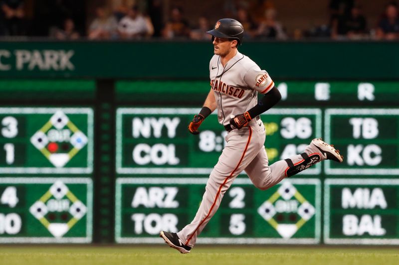 Jul 15, 2023; Pittsburgh, Pennsylvania, USA;  San Francisco Giants center fielder Mike Yastrzemski (5) circles the base on a solo home run against the Pittsburgh Pirates during the second inning at PNC Park. Mandatory Credit: Charles LeClaire-USA TODAY Sports