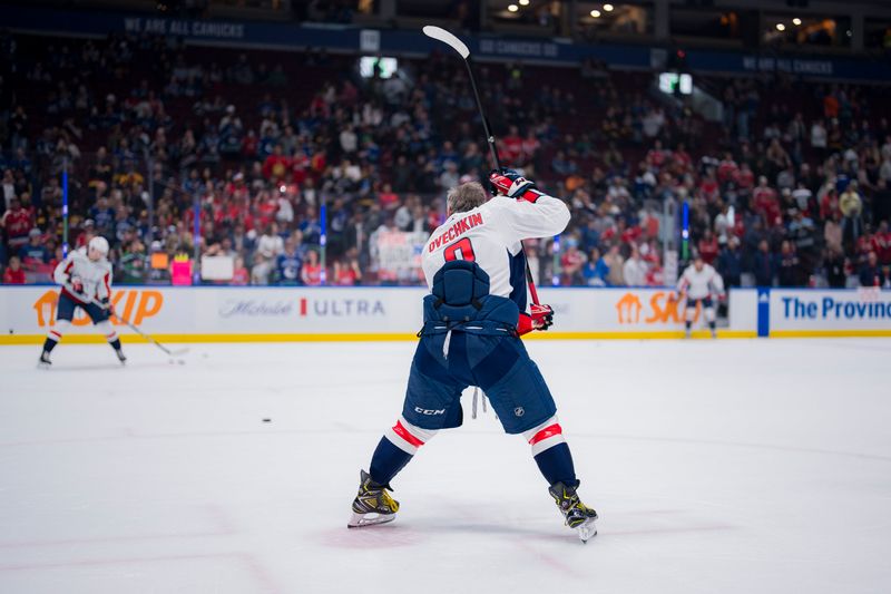 Mar 16, 2024; Vancouver, British Columbia, CAN; Washington Capitals forward Alex Ovechkin (8) shoots during warm up prior to a game against the Vancouver Canucks at Rogers Arena.  Mandatory Credit: Bob Frid-USA TODAY Sports