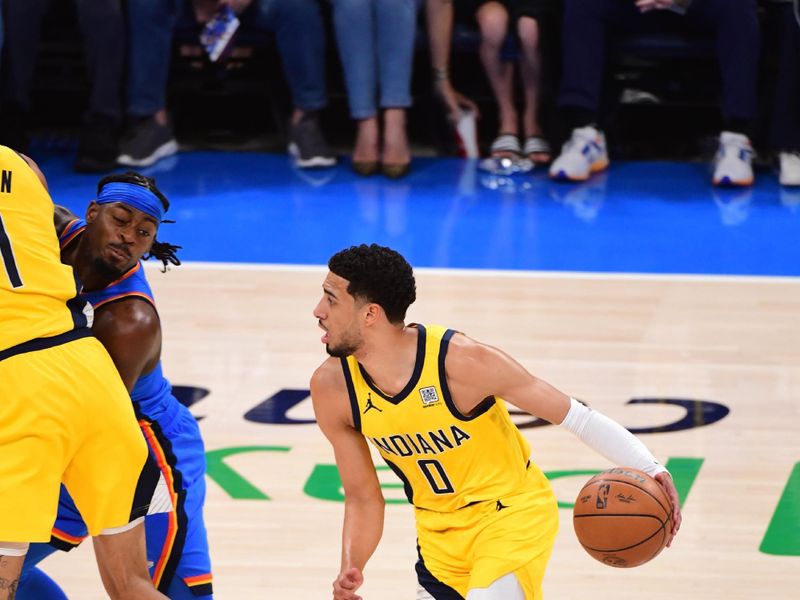 OKLAHOMA CITY, OK - JUNE 8: Tyrese Haliburton #0 of the Indiana Pacers drives to the basket during the game against the Oklahoma City Thunder during Game Two of the 2025 NBA Finals on June 8, 2025 at Paycom Center in Oklahoma City, Oklahoma. NOTE TO USER: User expressly acknowledges and agrees that, by downloading and or using this photograph, User is consenting to the terms and conditions of the Getty Images License Agreement. Mandatory Copyright Notice: Copyright 2025 NBAE (Photo by Adam Pantozzi/NBAE via Getty Images)