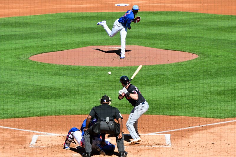 Feb 27, 2026; Mesa, Arizona, USA; Chicago Cubs pitcher Edward Cabrera (30) throws to Cleveland Guardians second baseman Daniel Schneemann (10)  in the second inning at Sloan Park. Mandatory Credit: Matt Kartozian-Imagn Images