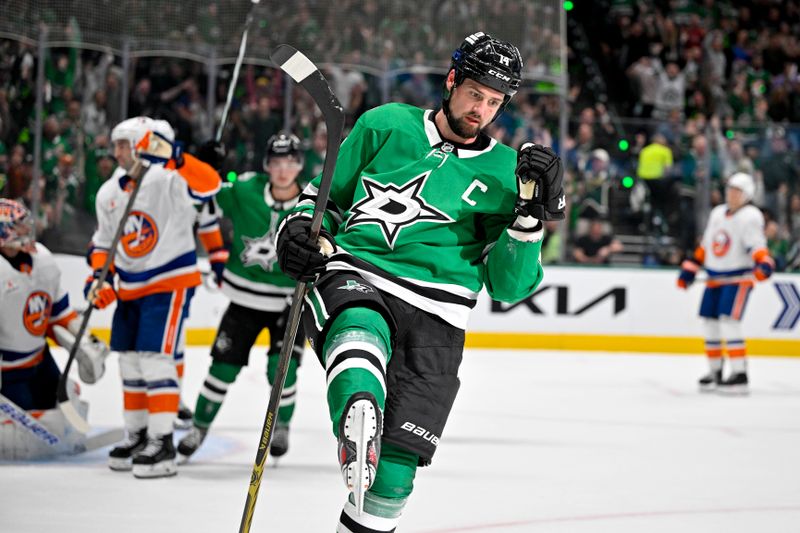 Oct 12, 2024; Dallas, Texas, USA; Dallas Stars left wing Jamie Benn (14) celebrates after he scores a goal against the New York Islanders during the second period at the American Airlines Center. Mandatory Credit: Jerome Miron-Imagn Images