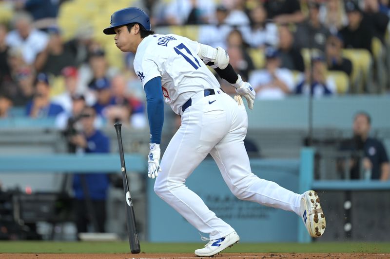 May 18, 2024; Los Angeles, California, USA;  Los Angeles Dodgers designated hitter Shohei Ohtani (17) grounds out in the first inning against the Cincinnati Reds at Dodger Stadium. Mandatory Credit: Jayne Kamin-Oncea-USA TODAY Sports