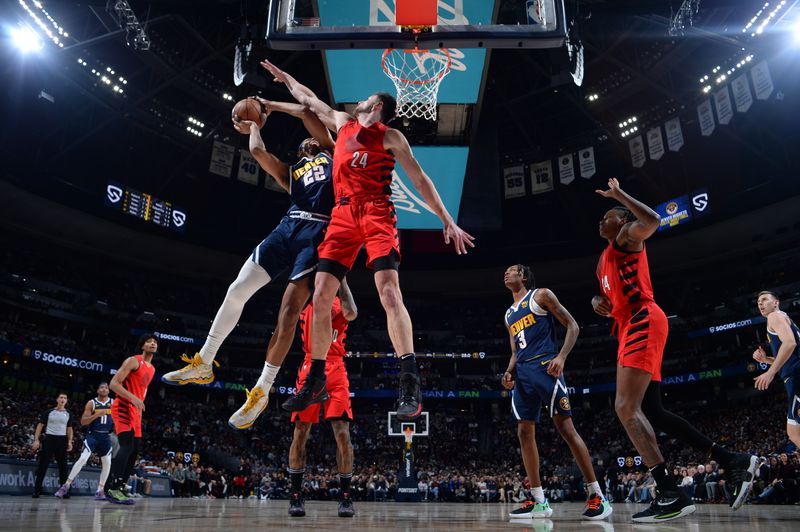 DENVER, CO - JANUARY 17: Zeke Nnaji #22 of the Denver Nuggets drives to the basket during the game against the Portland Trail Blazers on January 17, 2023 at the Ball Arena in Denver, Colorado. NOTE TO USER: User expressly acknowledges and agrees that, by downloading and/or using this Photograph, user is consenting to the terms and conditions of the Getty Images License Agreement. Mandatory Copyright Notice: Copyright 2023 NBAE (Photo by Bart Young/NBAE via Getty Images)