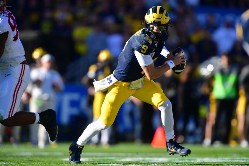 Jan 1, 2024; Pasadena, CA, USA; Michigan Wolverines quarterback J.J. McCarthy (9) runs in the first quarter against the Alabama Crimson Tide in the 2024 Rose Bowl college football playoff semifinal game at Rose Bowl. Mandatory Credit: Gary A. Vasquez-USA TODAY Sports