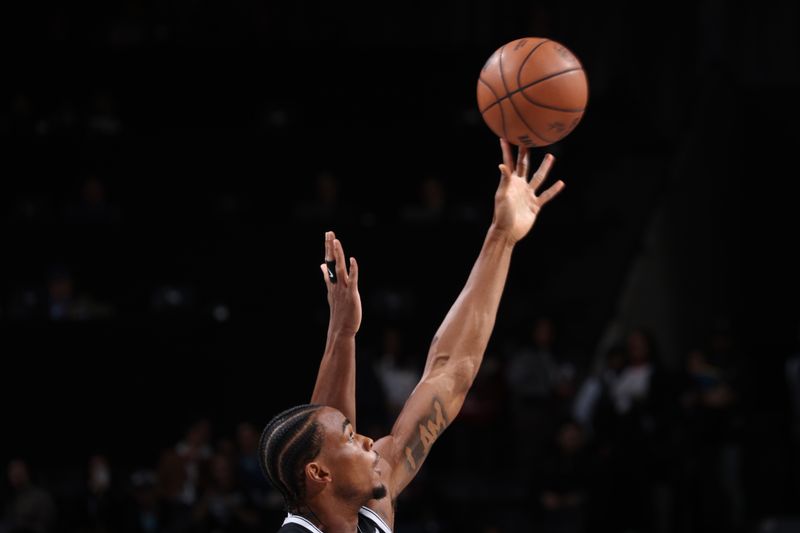 BROOKLYN, NY - MARCH 4: Nicolas Claxton #33 of the Brooklyn Nets goes up for the tipoff during the game against the Memphis Grizzlies on March 4, 2024 at Barclays Center in Brooklyn, New York. NOTE TO USER: User expressly acknowledges and agrees that, by downloading and or using this Photograph, user is consenting to the terms and conditions of the Getty Images License Agreement. Mandatory Copyright Notice: Copyright 2024 NBAE (Photo by Nathaniel S. Butler/NBAE via Getty Images)