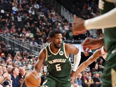 MILWAUKEE, WI - NOVEMBER 26: Malik Beasley #5 of the Milwaukee Bucks dribbles the ball during the game against the Portland Trail Blazers on November 26, 2023 at the Fiserv Forum Center in Milwaukee, Wisconsin. NOTE TO USER: User expressly acknowledges and agrees that, by downloading and or using this Photograph, user is consenting to the terms and conditions of the Getty Images License Agreement. Mandatory Copyright Notice: Copyright 2023 NBAE (Photo by Jeff Haynes/NBAE via Getty Images).