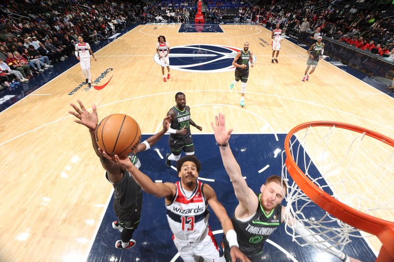 WASHINGTON, DC -? JANUARY 13:  Jordan Poole #13 of the Washington Wizards drives to the basket during the game against the Minnesota Timberwolves on January 13, 2025 at Capital One Arena in Washington, DC. NOTE TO USER: User expressly acknowledges and agrees that, by downloading and or using this Photograph, user is consenting to the terms and conditions of the Getty Images License Agreement. Mandatory Copyright Notice: Copyright 2025 NBAE (Photo by Stephen Gosling/NBAE via Getty Images)