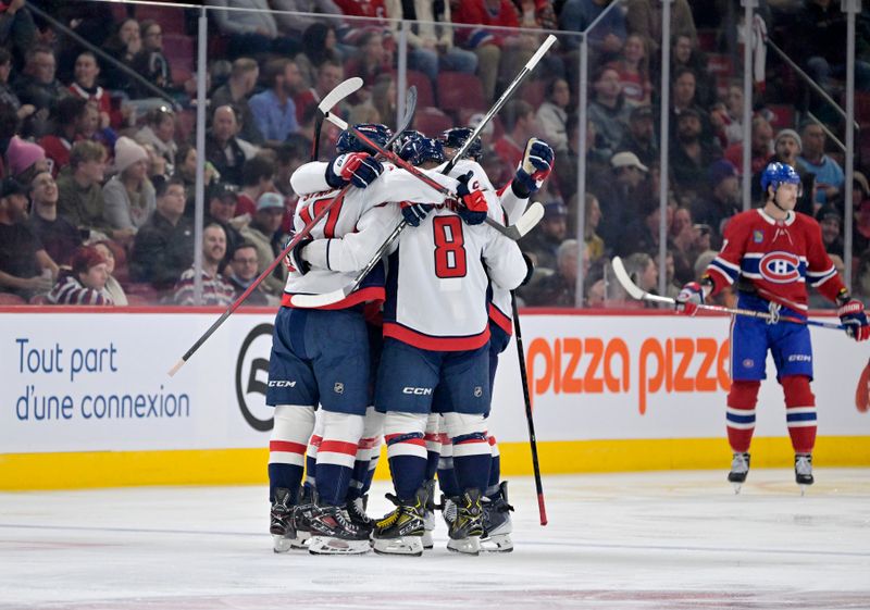 Nov 20, 2025; Montreal, Quebec, CAN; Washington Capitals forward Alex Ovechkin (8) celebrates with teammates after scoring a goal against the Montreal Canadiens during the first period at the Bell Centre. Mandatory Credit: Eric Bolte-Imagn Images