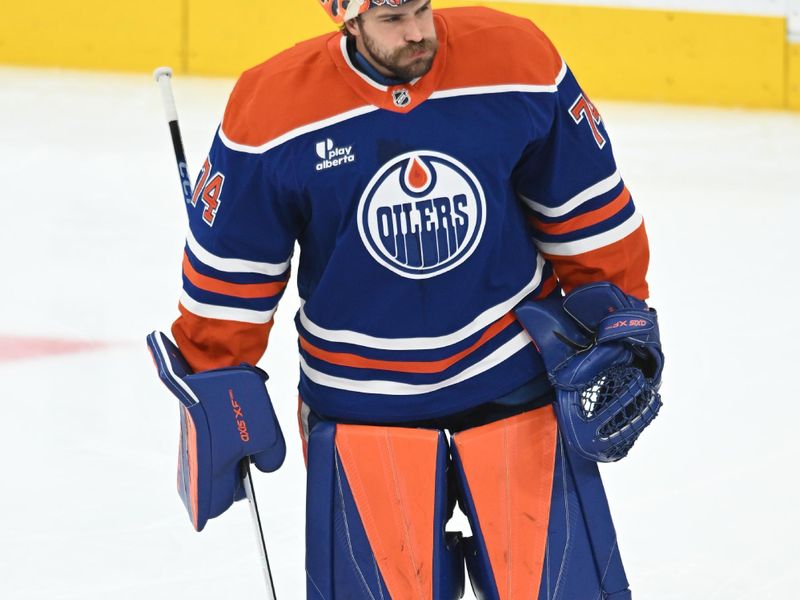 May 12, 2025; Edmonton, Alberta, CAN; Edmonton Oilers goalie Stuart Skinner (74) is seen out on the ice during the pre game warm up before in game abasing the Vegas Golden Knights three of the second round of the 2025 Stanley Cup Playoffs at Rogers Place. Mandatory Credit: Walter Tychnowicz-Imagn Images