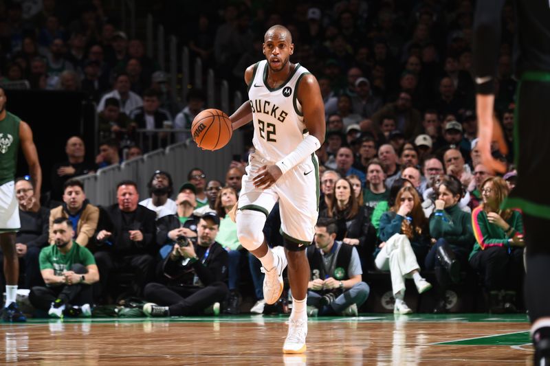 BOSTON, MA - MARCH 20: Khris Middleton #22 of the Milwaukee Bucks handles the ball during the game against the Boston Celtics on March 20, 2024 at the TD Garden in Boston, Massachusetts. NOTE TO USER: User expressly acknowledges and agrees that, by downloading and or using this photograph, User is consenting to the terms and conditions of the Getty Images License Agreement. Mandatory Copyright Notice: Copyright 2024 NBAE  (Photo by Brian Babineau/NBAE via Getty Images)