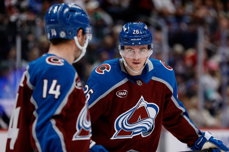 Apr 10, 2025; Denver, Colorado, USA; Colorado Avalanche left wing Jimmy Vesey (26) and right wing Chris Wagner (14) in the third period against the Vancouver Canucks at Ball Arena. Mandatory Credit: Isaiah J. Downing-Imagn Images
