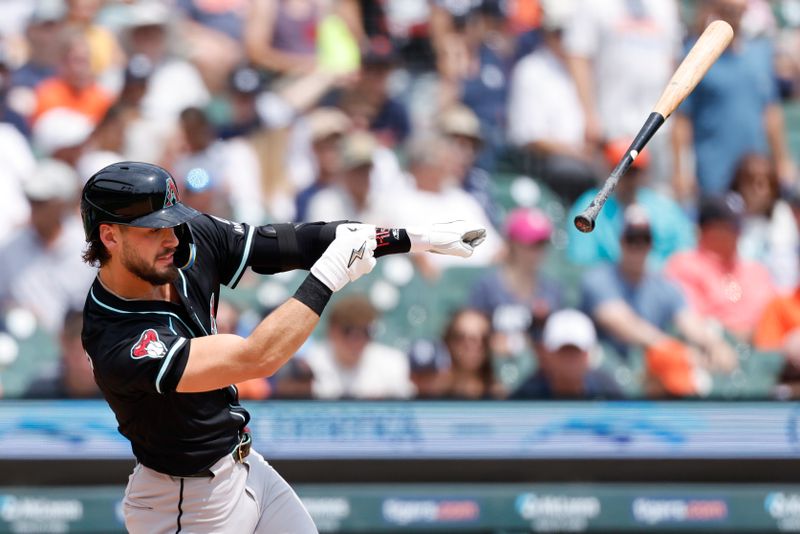 Jul 30, 2025; Detroit, Michigan, USA;  Arizona Diamondbacks shortstop Blaze Alexander (9) looses his grip on the bat in the third inning against the Detroit Tigers at Comerica Park. Mandatory Credit: Rick Osentoski-Imagn Images