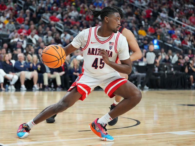 Mar 9, 2023; Las Vegas, NV, USA; Arizona Wildcats guard Cedric Henderson Jr. (45) dribbles against the Stanford Cardinal during the second half at T-Mobile Arena. Mandatory Credit: Stephen R. Sylvanie-USA TODAY Sports