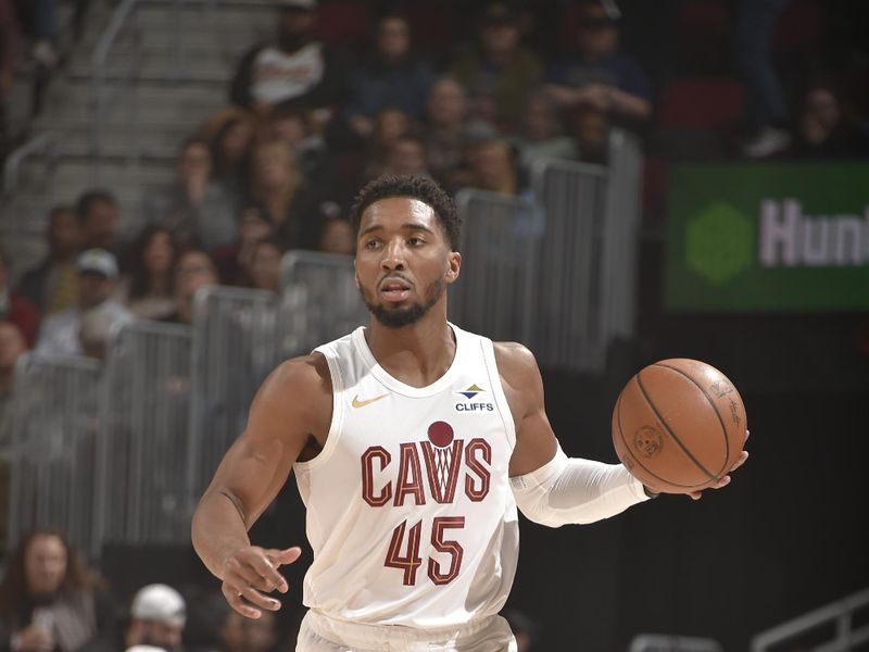 CLEVELAND, OH - DECEMBER 13: Donovan Mitchell #45 of the Cleveland Cavaliers dribbles the ball during the game against the Washington Wizards on December 13, 2024 at Rocket Mortgage FieldHouse in Cleveland, Ohio. NOTE TO USER: User expressly acknowledges and agrees that, by downloading and/or using this Photograph, user is consenting to the terms and conditions of the Getty Images License Agreement. Mandatory Copyright Notice: Copyright 2024 NBAE (Photo by David Liam Kyle/NBAE via Getty Images)